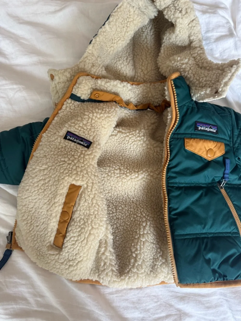 Patagonia Sherpa-Lined Puffer Jacket in Dark Green + Tan reversible